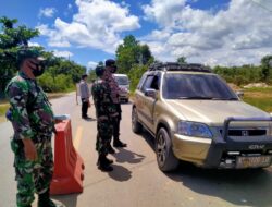 Cegah Penyebaran Covid-19, Personel Gabungan TNI-PolRi Satpol PP dan Diskes Dirikan Posko Pemeriksaan di Desa Miau Baru, Perbatasan Kutim-Berau Dijaga Ketat
