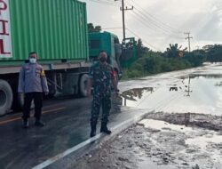 Terus Pantau Debit Air, Personel Koramil Sangatta Tingkatkan Kesiapsiagaan, Akibat Curah Hujan Tinggi