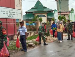 Peringati HUT Kodam VI/Mulawarman ke-64, Koramil Sangkulirang Bersihkan Fasilitas Umum
