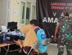 Vaksinasi di Sangkulirang Sukses, Babinsa Terdepan Beri Pengawalan