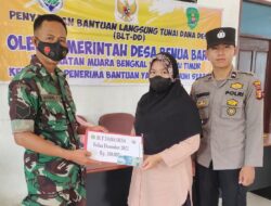Babinsa Koramil Muara Bengkal Kawal Penyerahan BLT