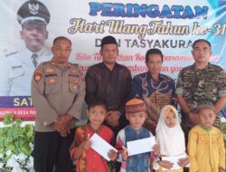 Babinsa Koramil Sangatta Hadiri Syukuran Hari Jadi Desa Rantau Makmur