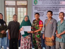 Babinsa Koramil Muara Wahau Kawal Penyerahan BLT