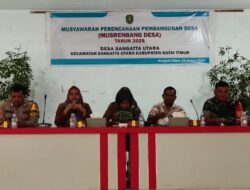 Hadiri Musyawarah Kerja Desa 2025, Babinsa Koramil Sangatta Harapkan Program Memakmurkan Masyarakat